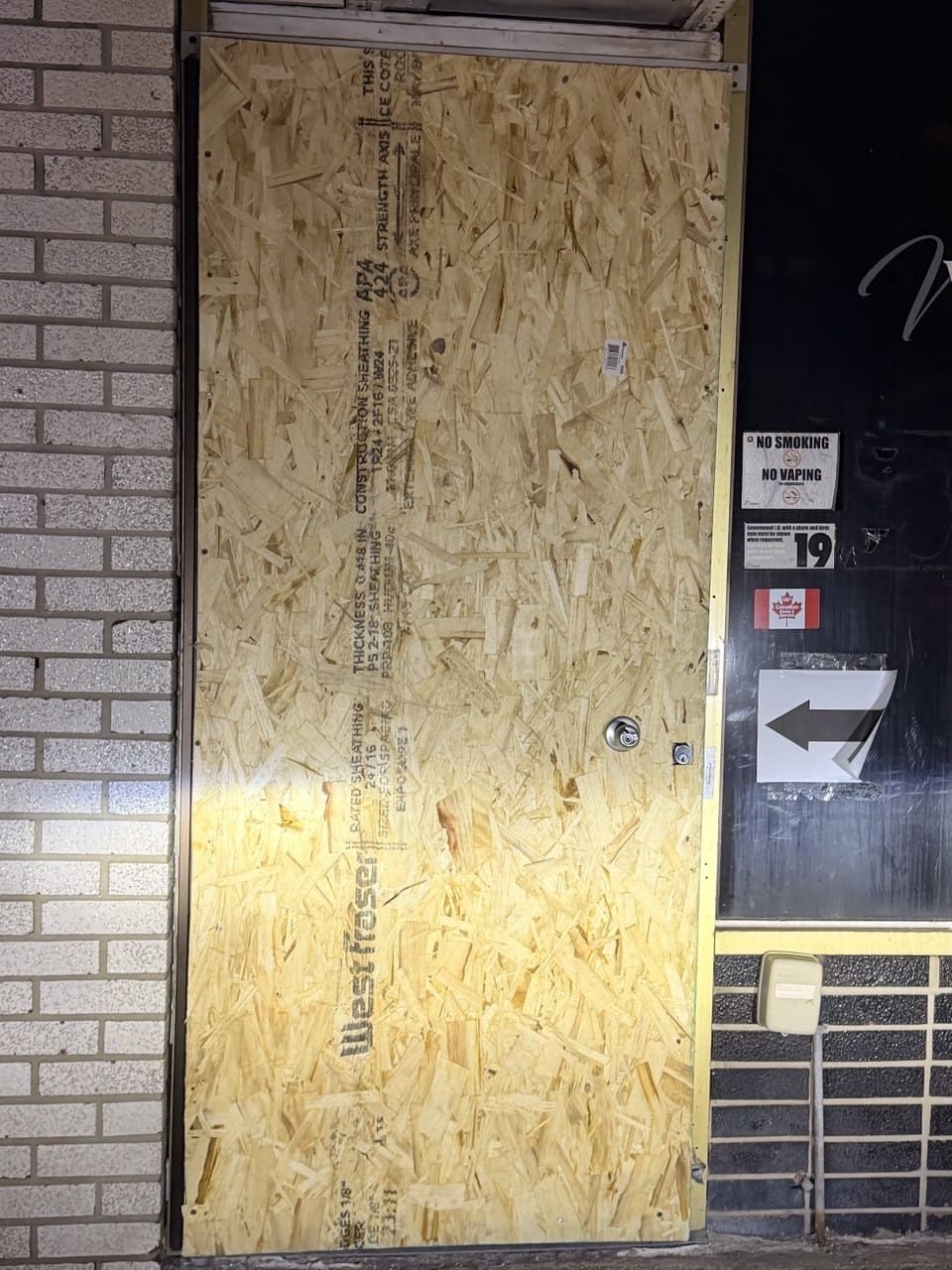 Emergency board-up installed to secure a commercial opening and provide temporary access