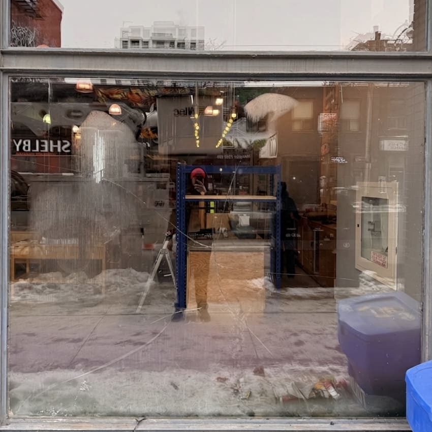 Broken commercial insulated glass unit before replacement