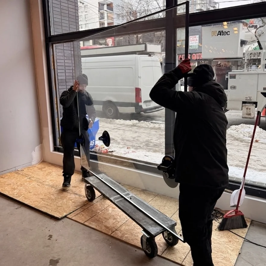 Delivery of a large insulated glass unit into a commercial space