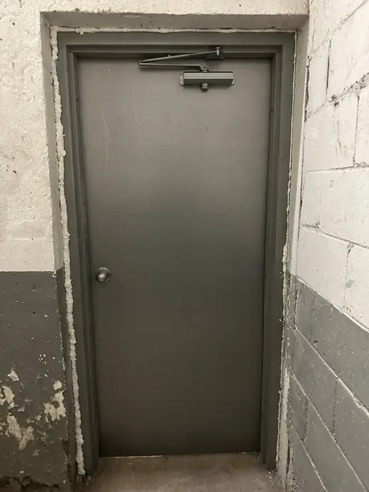 Replacement boiler room fire-rated door with surface closer in Newtonbrook, North York