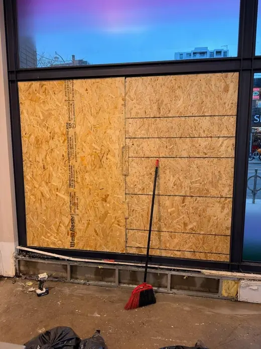 After: Broken Queen West Store Window Boarded Up Near Spadina - Toronto