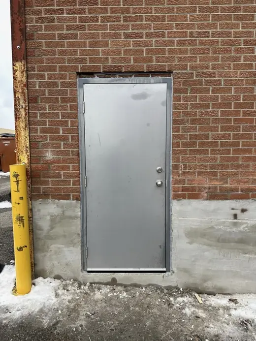 After: Fire-Rated Stairwell Door Replacement near Konrad Crescent and Markham Golf Dome - Markham
