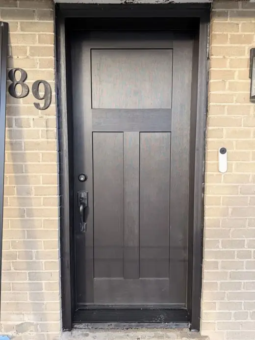 Solid privacy front door installed in Oakville with cleaner lines and better sealing