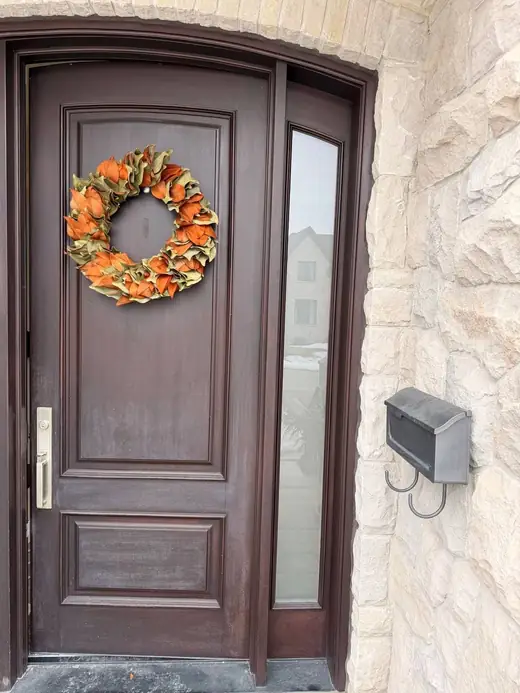 New clear sidelight glass installed at a front entrance in Milton after replacement