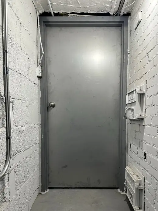 Fire-rated steel basement door and frame installed in Burlington