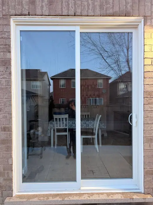 Backyard sliding patio door replaced in Caledon with smoother operation and better sealing