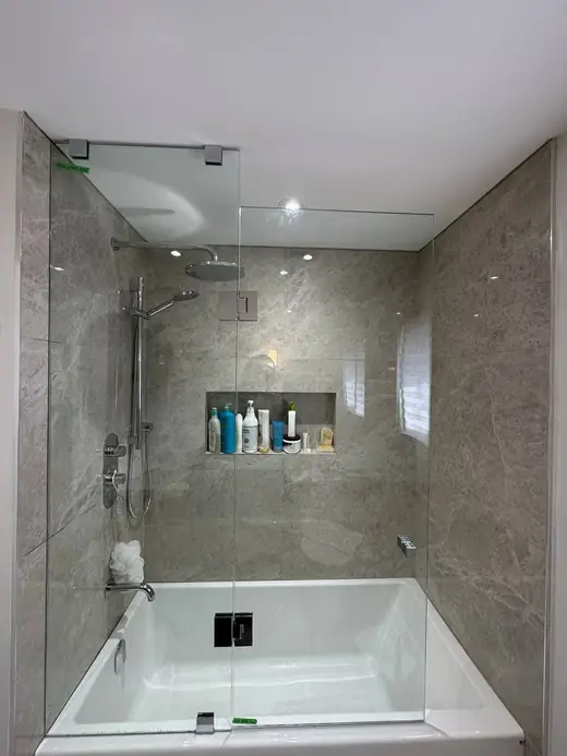 Frameless shower glass over a bathtub in Uxbridge & Scugog
