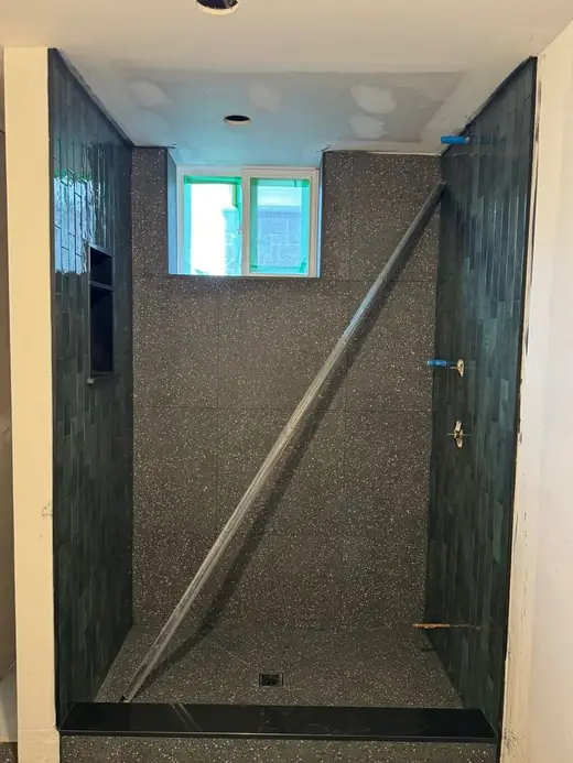 Finished Brampton shower tile area before the walk-in glass panel was installed