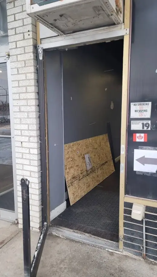 Mississauga business entrance after break-in damage before emergency board-up