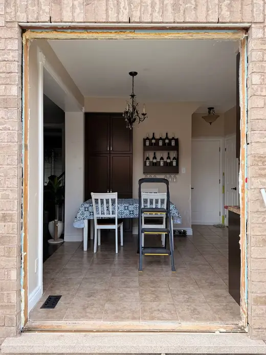 Old Caledon backyard sliding door opening before full patio door replacement
