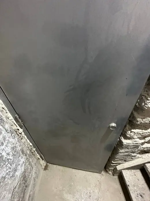Brock Township metal exit door before push bar and panic hardware installation