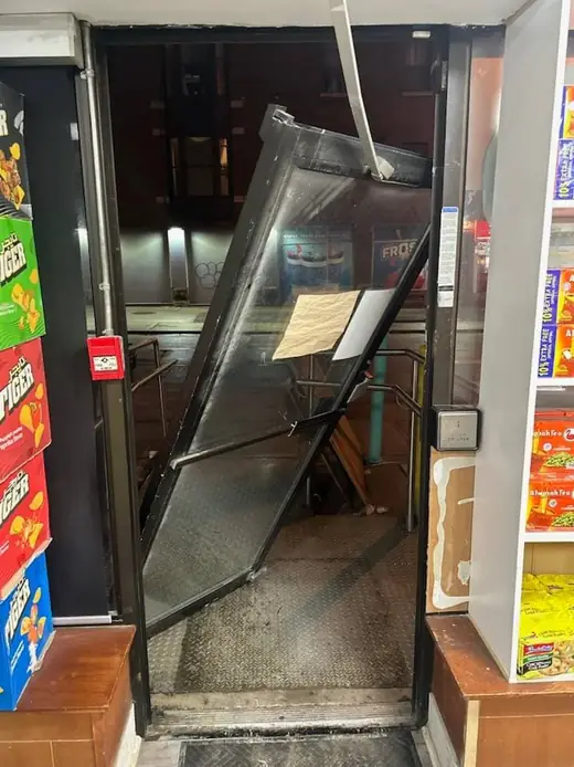 Failed commercial entrance door in North York before emergency repair