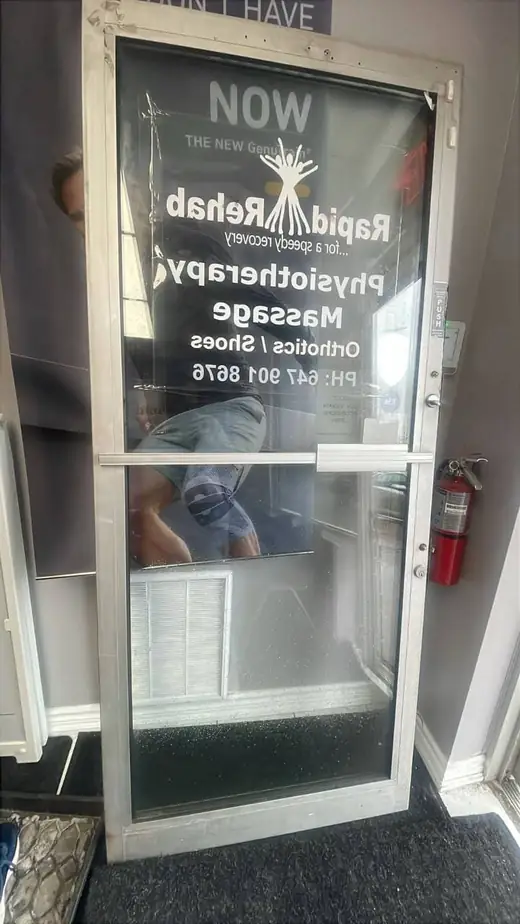 Foggy commercial entrance door glass in Mississauga before replacement