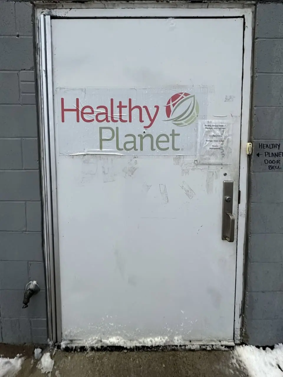 Healthy Planet rear commercial door reinstalled after break-in damage in Vaughan