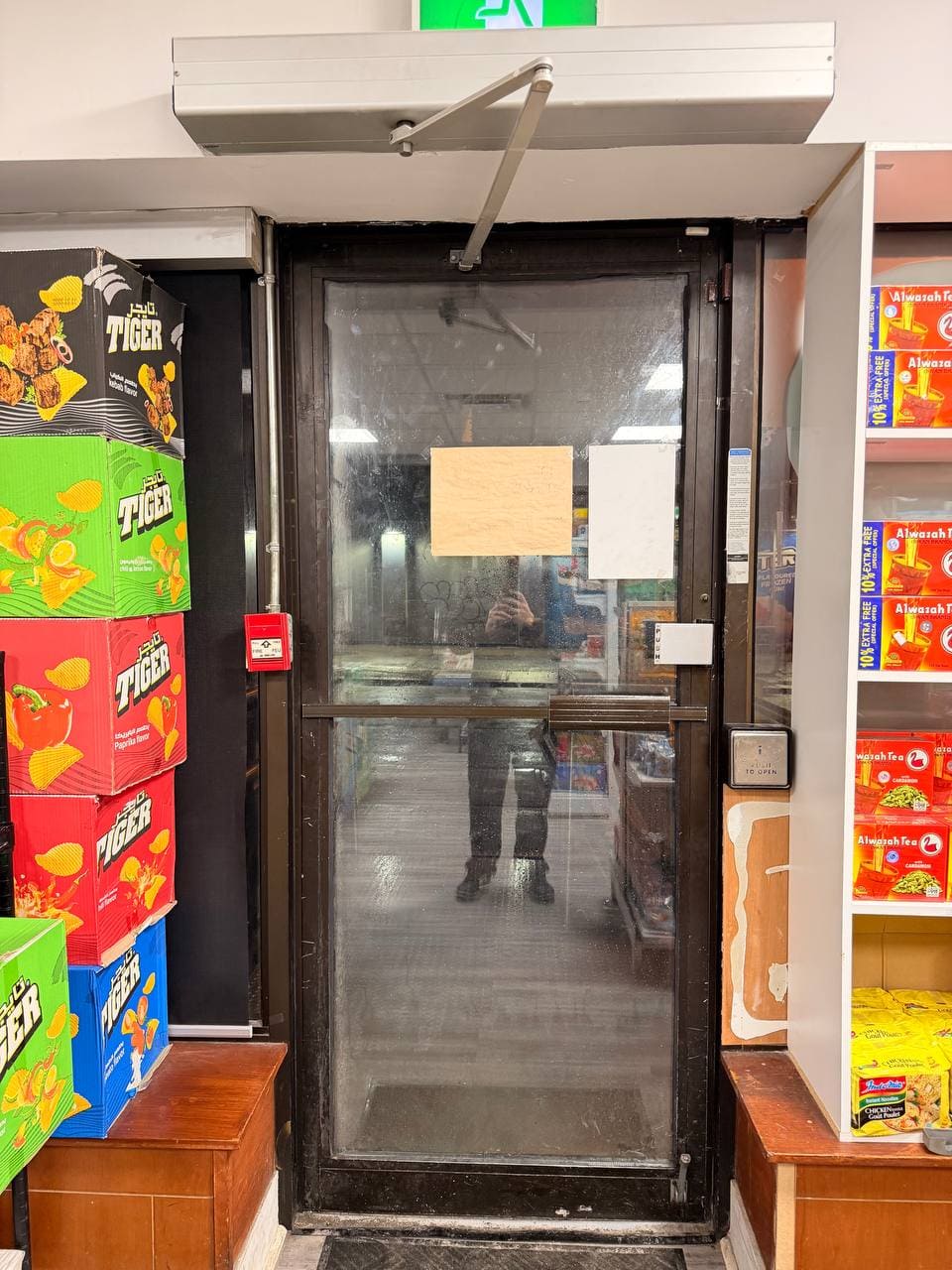 Commercial entrance door in North York after emergency repair and realignment