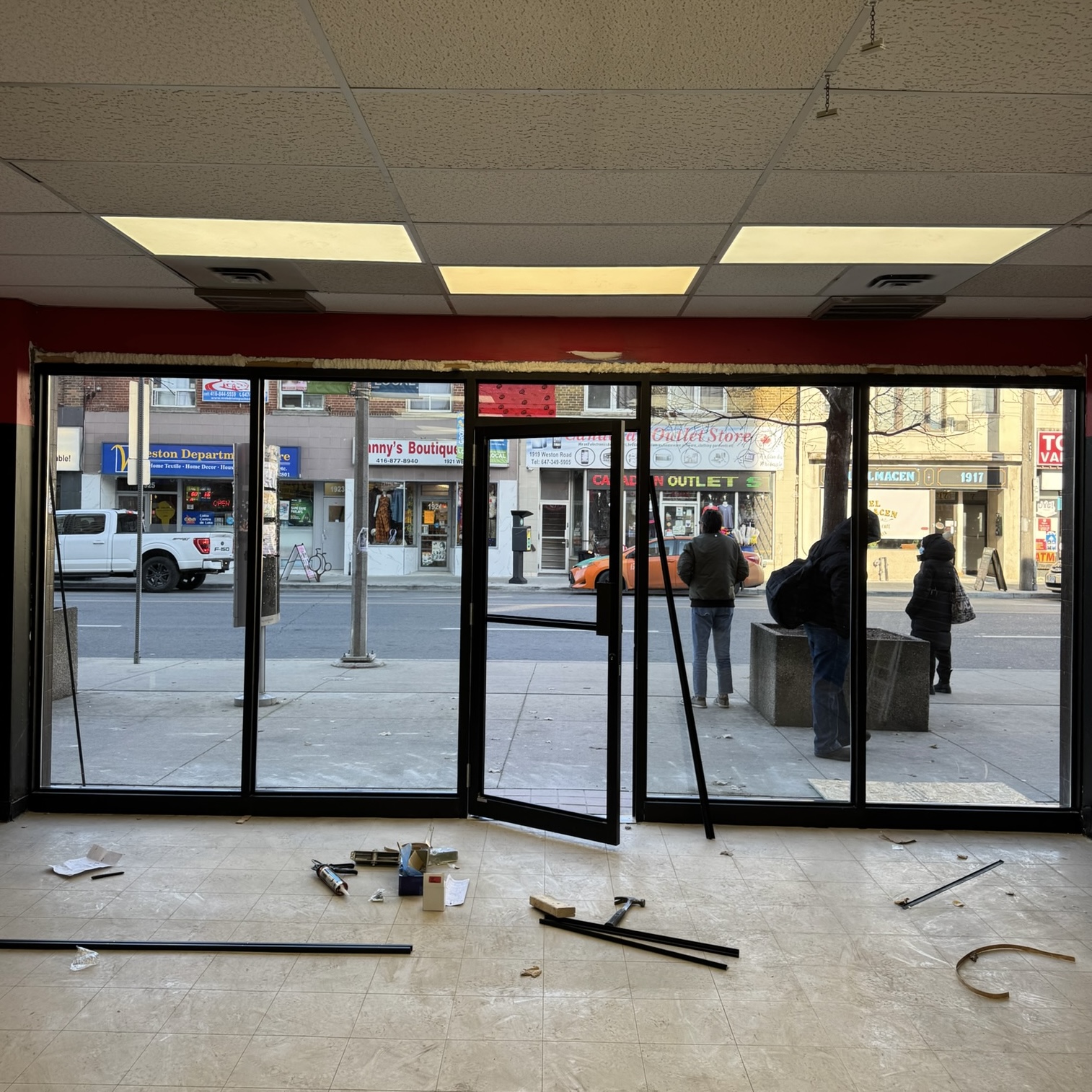 Aluminum storefront entrance door alignment and hardware check