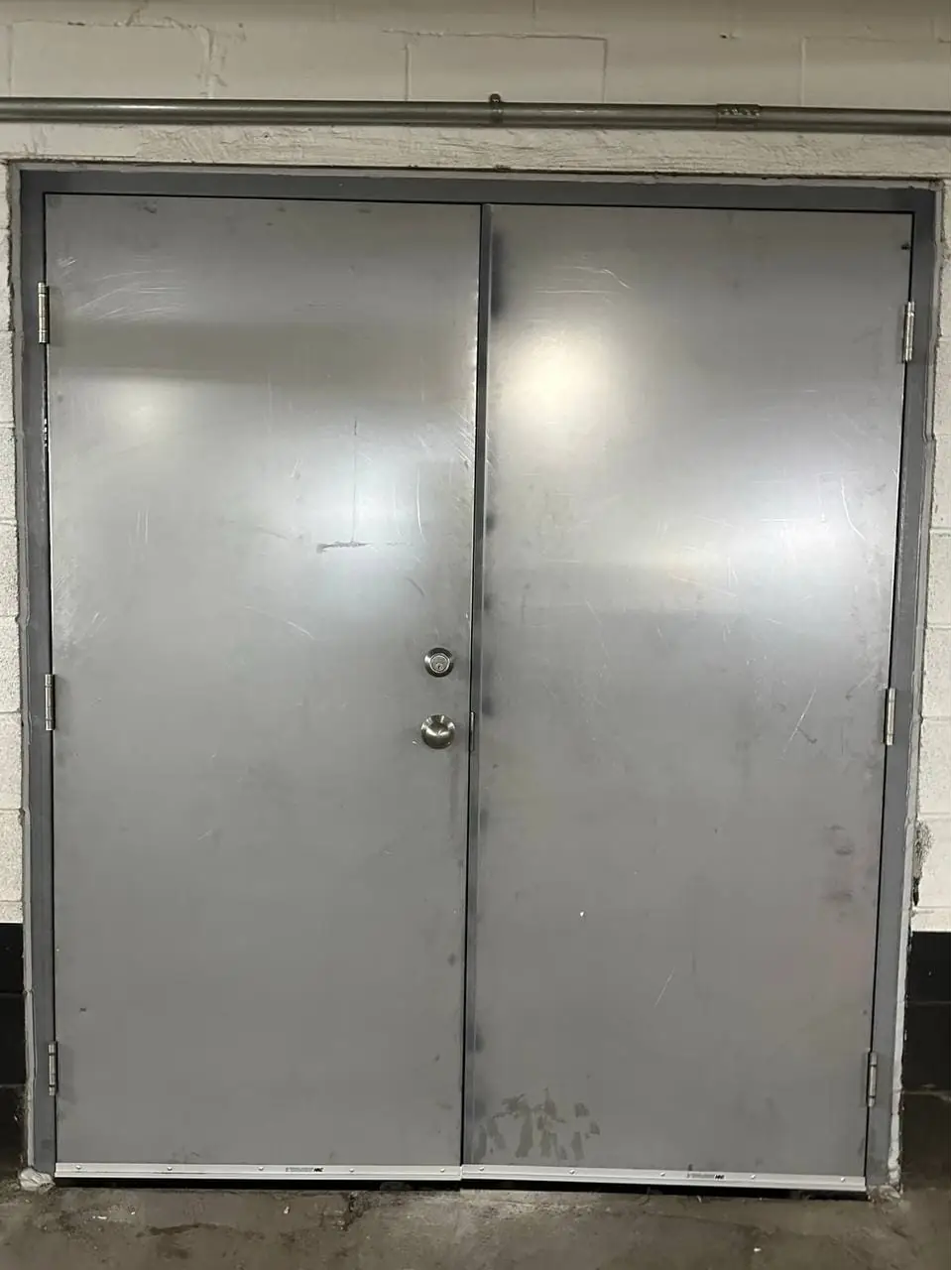 Clarington steel double-door opening shown without surface door closers.