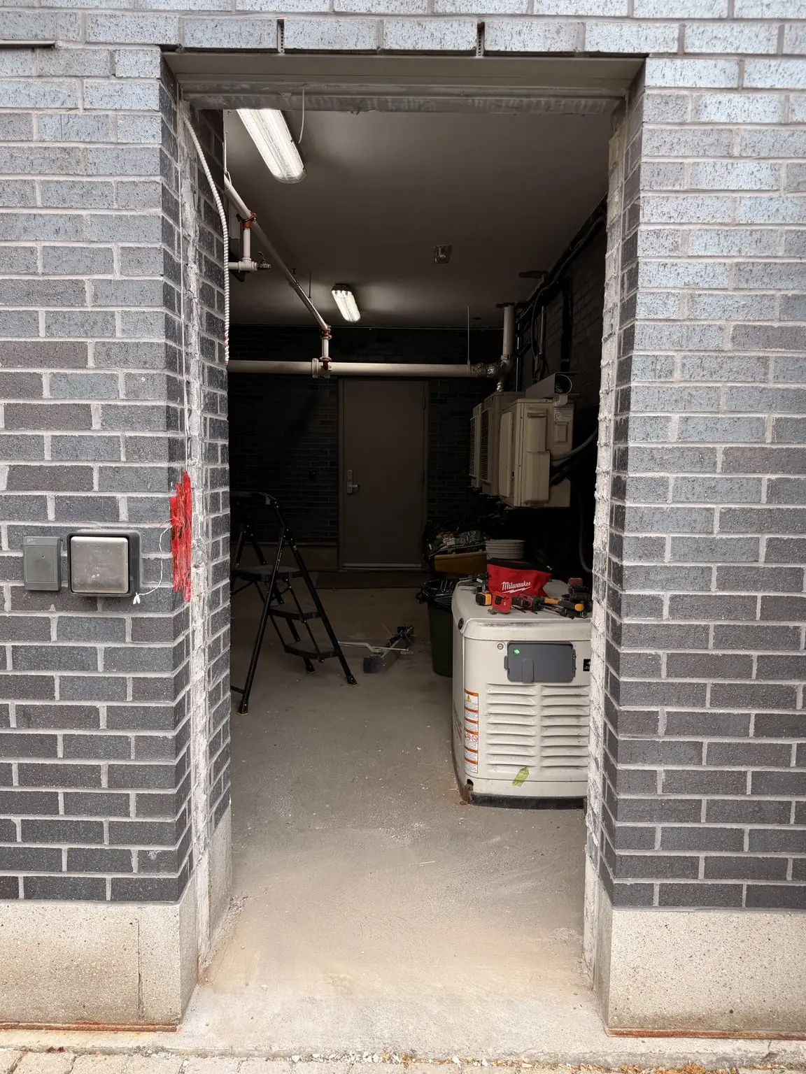Clean commercial door opening prepared for replacement frame and door