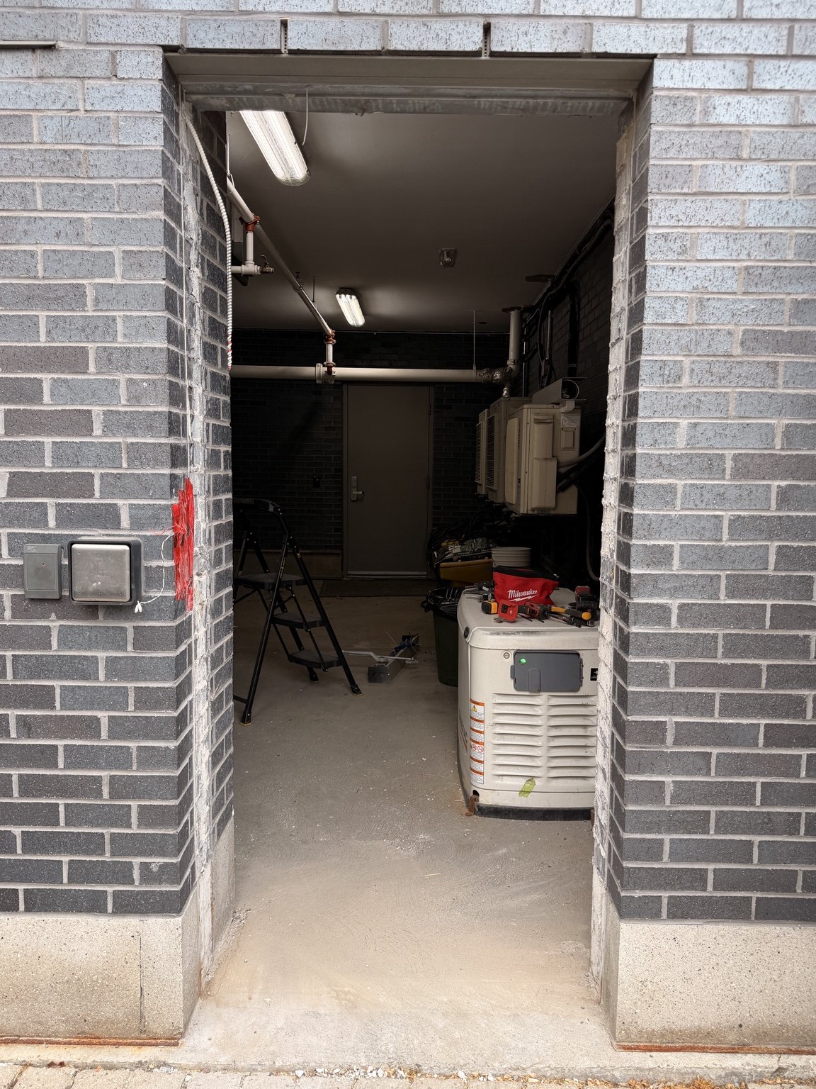 Clean commercial door opening prepared for replacement frame and door
