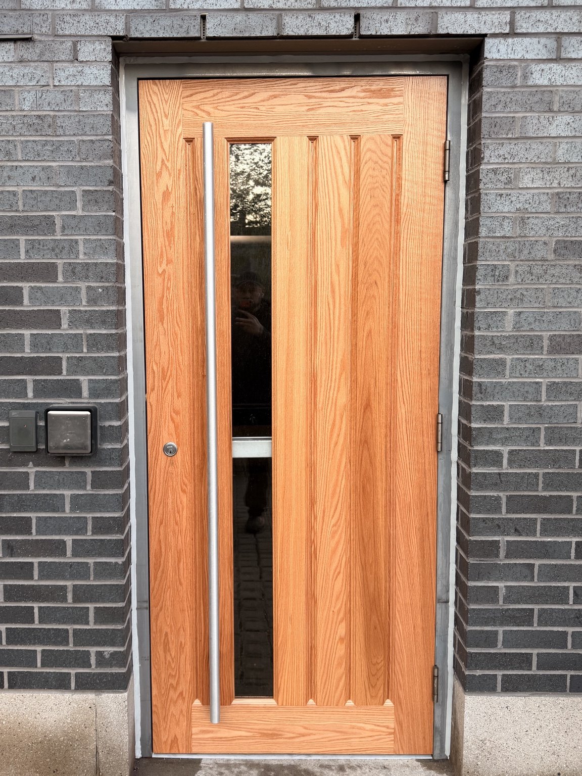 Finished commercial door replacement with vision lite, panic hardware and door closer