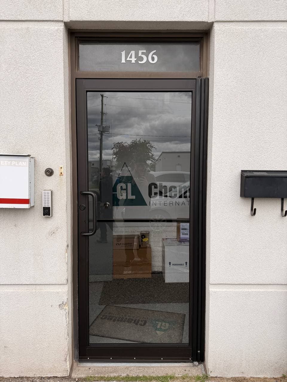 Toronto business entrance door after full-length continuous geared hinge installation and realignment