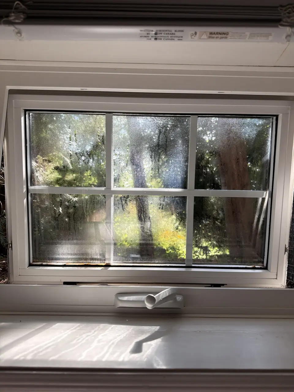 Fogged window glass before sealed-unit replacement in Etobicoke