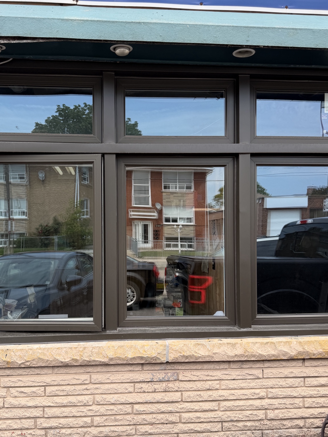 New commercial glass installed at an auto repair shop on Portland Street in Mimico