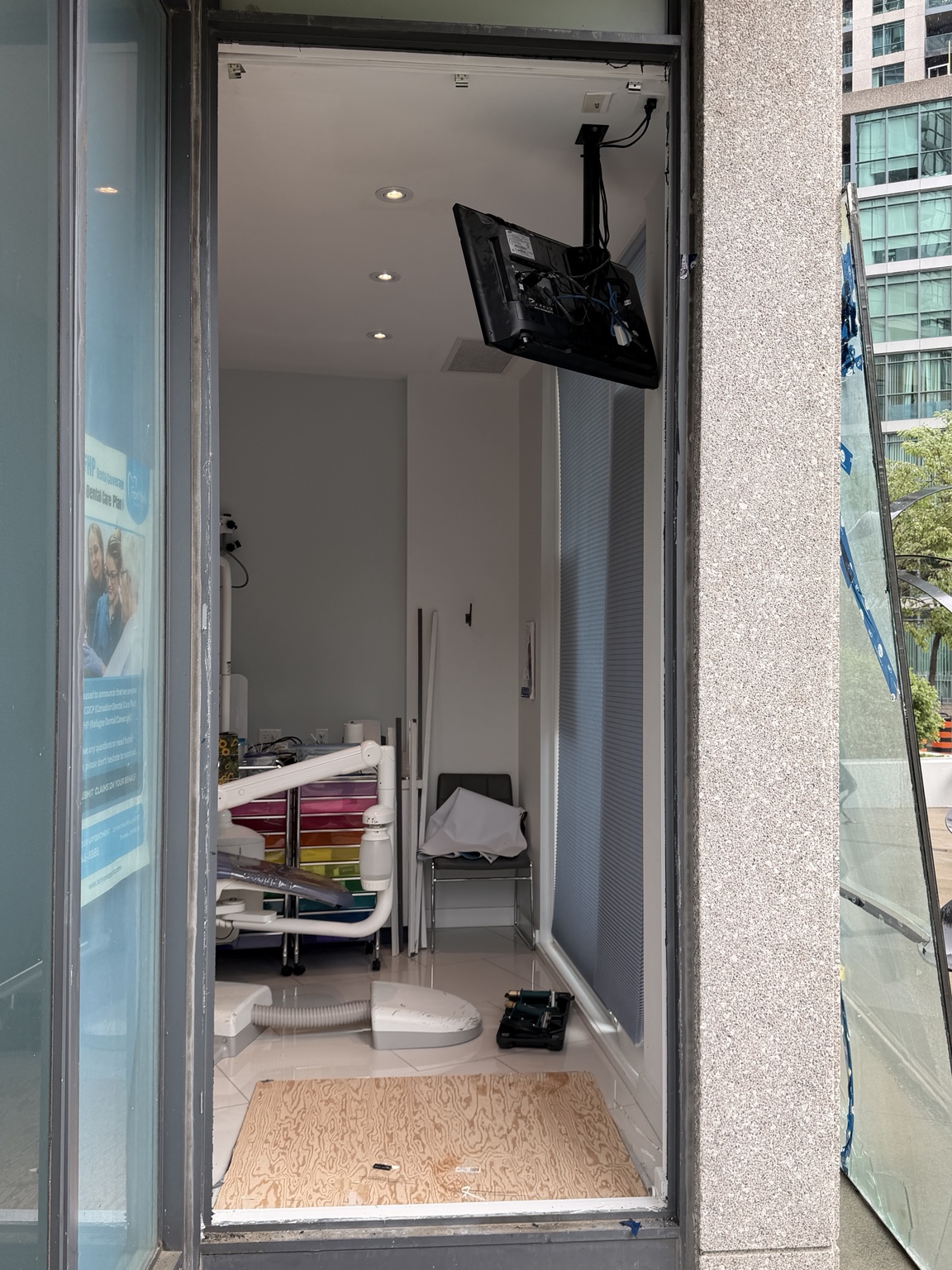 Commercial storefront opening cleared after broken glass removal