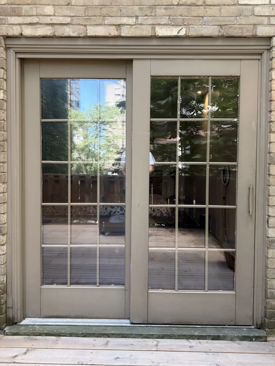 New sliding patio door glass with grille inserts after repair in Yorkville Toronto