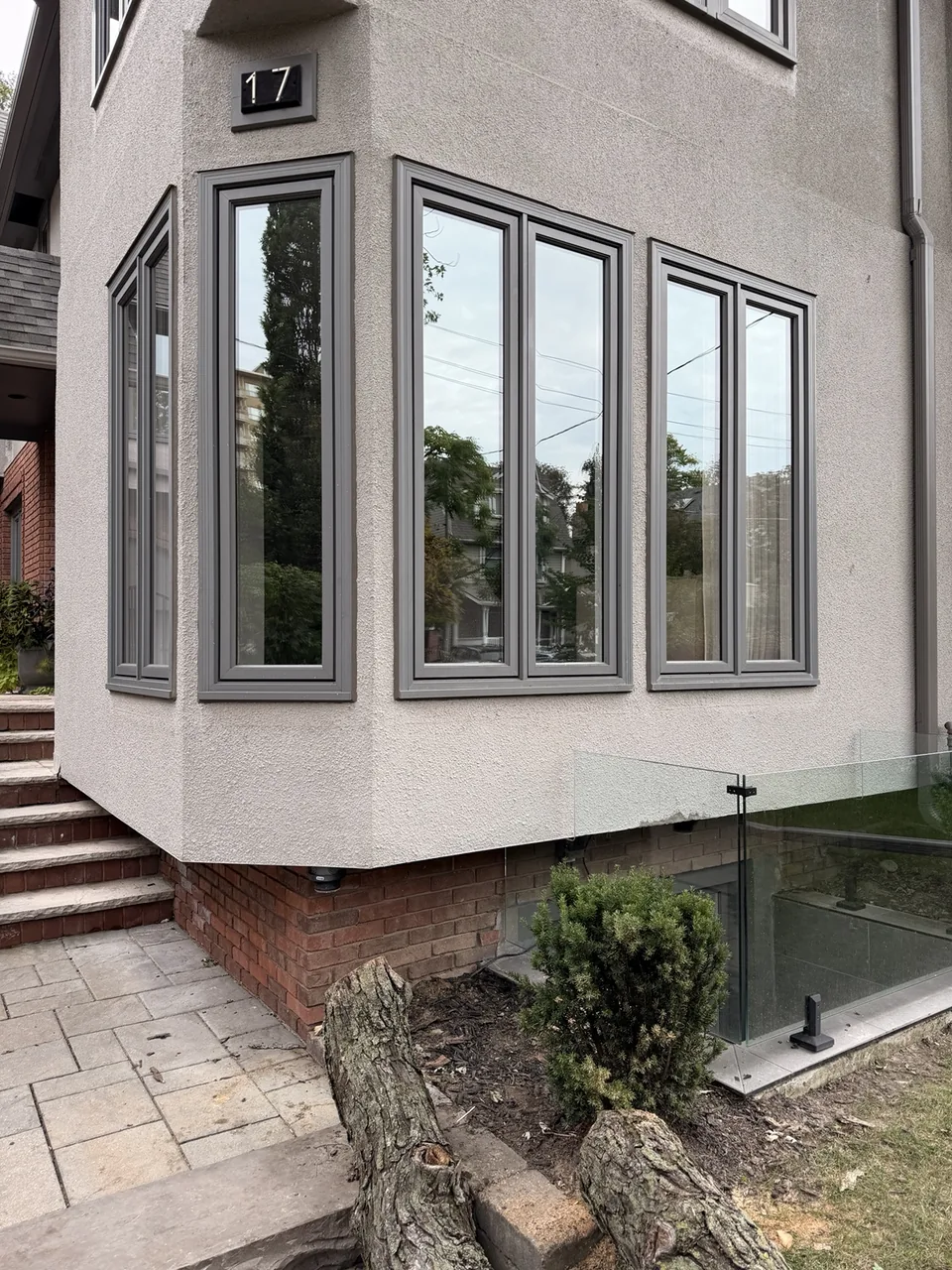 New glass and repaired window on the Toronto home after storm damage