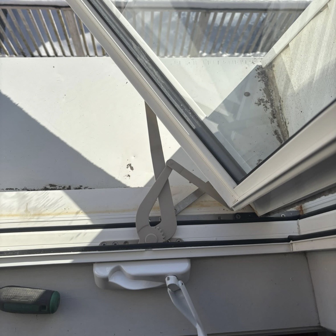New casement window crank operator and support arms installed