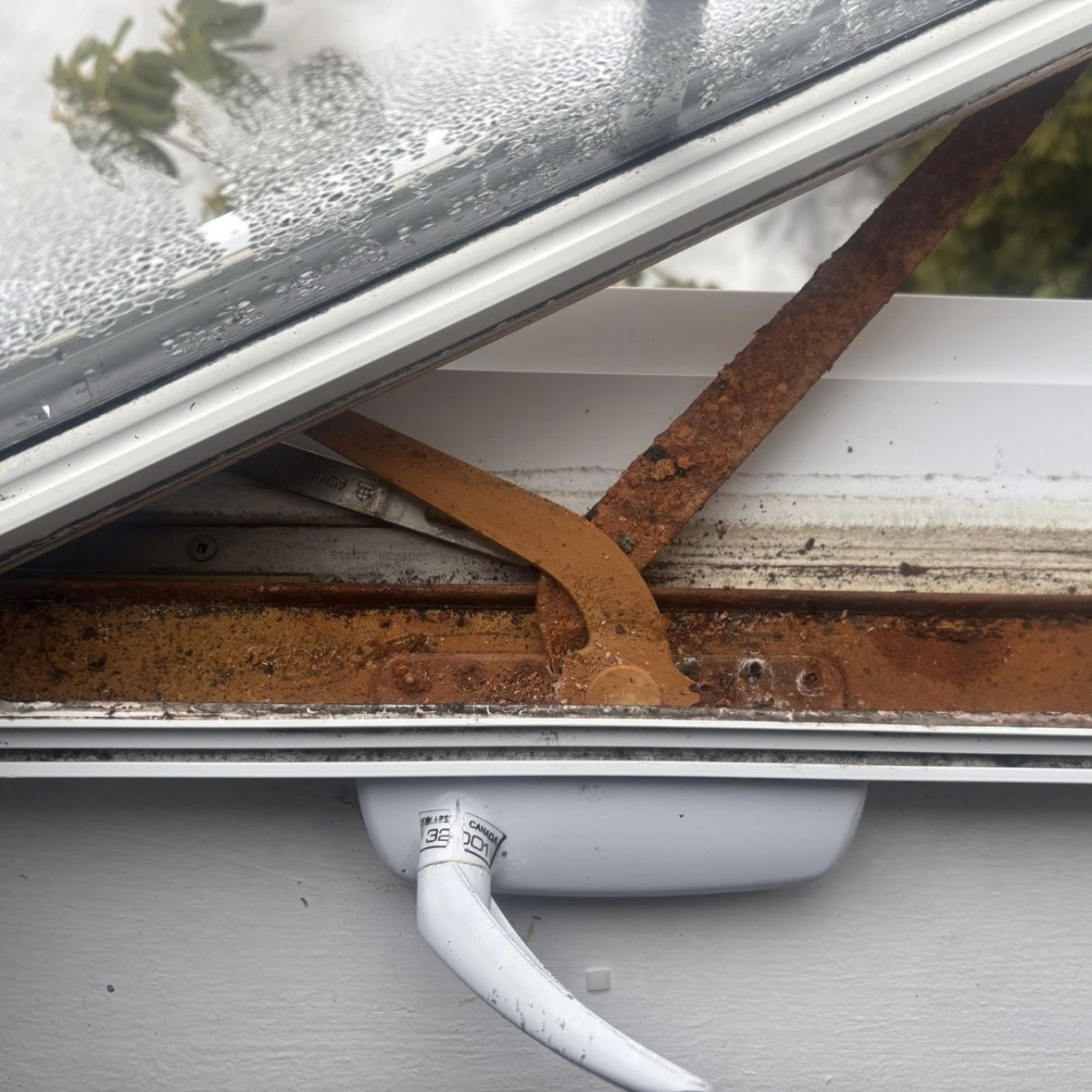 Severely rusted casement window crank operator and linkage